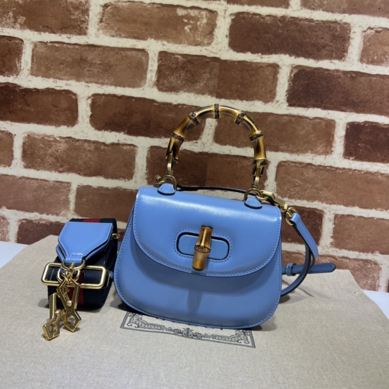 G*u*i top handle bags